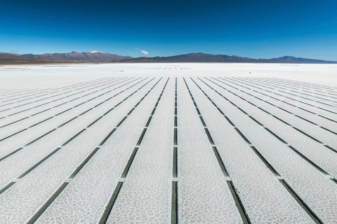 Aerial view of the geometric grid pattern created by salt extraction lines in Salinas Grandes,