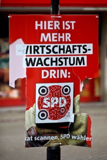 Destroyed SPD election poster in the pedestrian zone of Wattenscheid, Bochum, Ruhr area, North