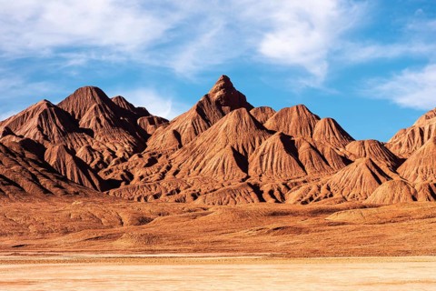 This image showcases the unforgiving terrain of Devil's Desert in Salta, Argentina. The sharp,