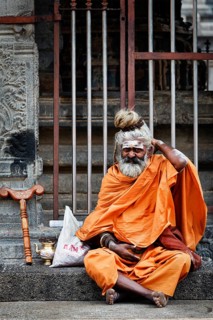 TIRUVANAMALLAI, INDIA, JANUARY 7, 2010: Sadhu, religious ascetic or holy person, in Hindu temple