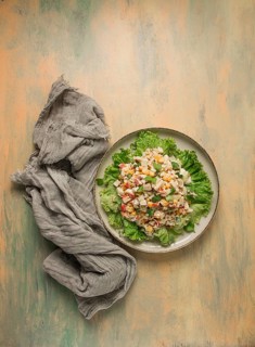 Canned corn salad, with crab sticks, top view, no people