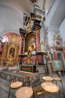 Sacrificial candles on the side altar in the baroque church of St Martin, Grüner Markt, Bamberg,