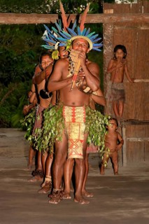 Traditional tribal dance from the Dessanos tribe with face paintings and wearing a traditional hat