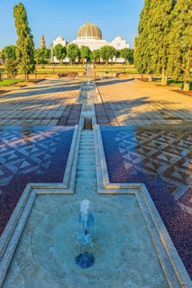 Park of the Sultan Qaboos Mosque, behind the mosque with the domes and minarets, Muscat, Arabian