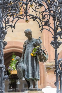 The Gänseliesel fountain is a market and ornamental fountain on the market square in front of the