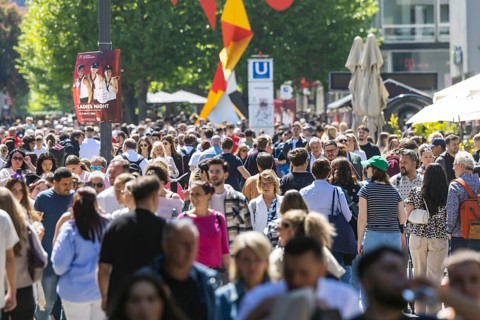 Many people on the way in the pedestrian zone Königsstraße. Crowd in Stuttgart, Baden-Württemberg,