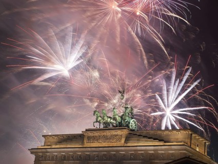 Fireworks over the Brandenburg Gate in Berlin, Germany, during New Year concert and celebrations