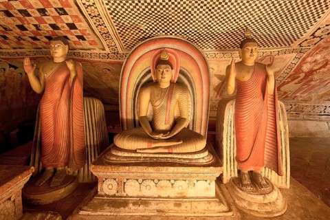 Buddha statues and murals in Dambulla Cave Temple, Dambulla, Sri Lanka