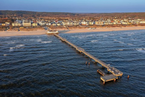 Aerial view over restaurant on Ahlbeck Pier/ Seebrücke Ahlbeck in the Baltic Sea on Usedom island,