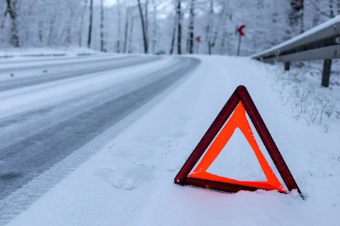 Car left the road in a bend due to snow and ice, Spitzgrund Coswig, Saxony, Germany