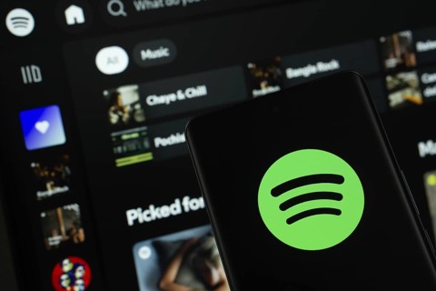 Dhaka, Bangladesh - 18 March 2025: The logo of the spotify is displayed on a smartphone screen, and