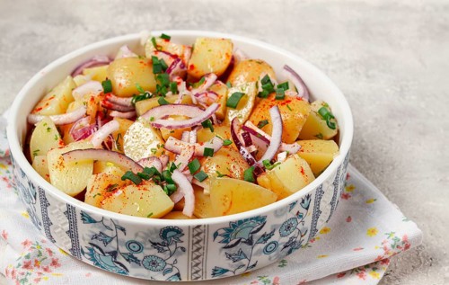 Boiled potato salad with red onion, German cuisine, homemade, no people