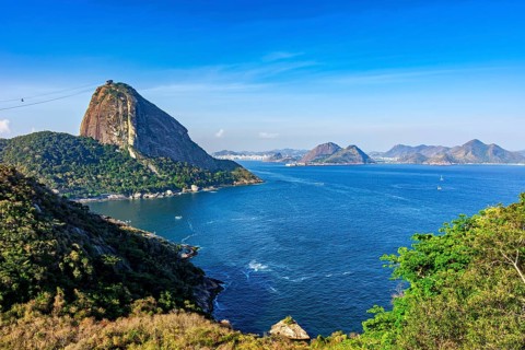 Sugarloaf Mountain and the entrance to Guanabara Bay in Rio de Janeiro with the city of Niteroi and