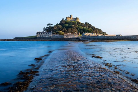 View of St Michaels Mount, in front of it the dam or path, slightly washed over by the tide.
