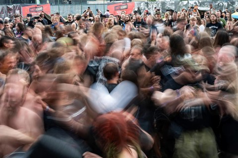 JAROCIN, POLAND - JULY 18, 2025: Jarocin Festival 2025 with rock music. Fans dance the pogo in