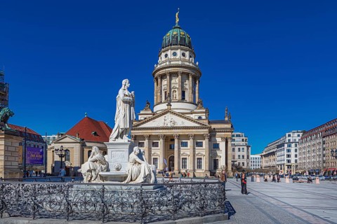 Schiller Monument and French Cathedral on the Gendarmenmarkt in Berlin, Germany