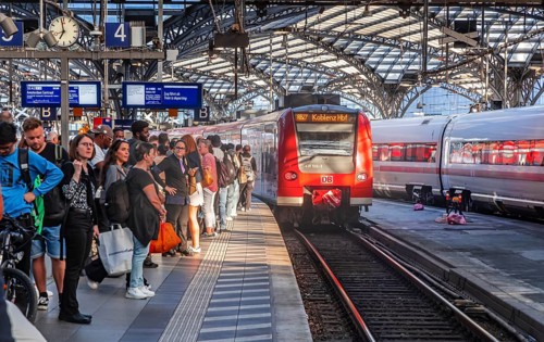 Cologne Central Station. Travellers wait on the platform for their train. Regional train to Koblenz