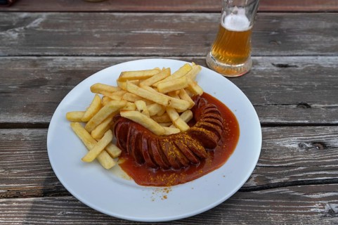 Currywurst with chips and wheat beer, Bavaria, Germany