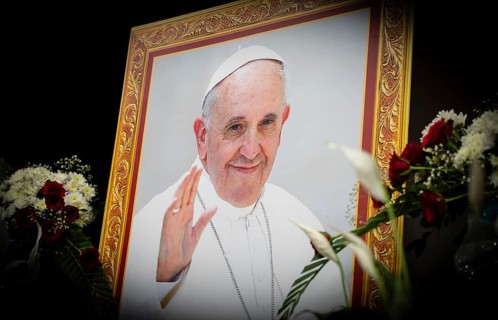 Framed photo of Pope Francis stands during the ceremonial tribute in Guwahati, Assam, India on