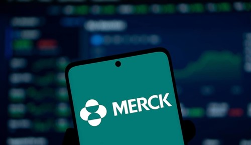 Merck logo is displayed on smartphone. Merck & Co Inc is an American multinational pharmaceutical