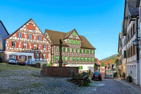 Gasthof Sonne and other historic half-timbered houses on the market square of Schiltach with market