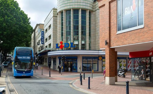 Bus passing Odeon and Lidl store shop in Broadmeads shopping centre, Bristol, England, UK