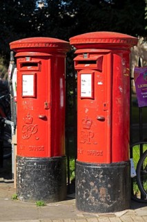 Red letterboxes, city centre, Cambridge, England, Great Britain