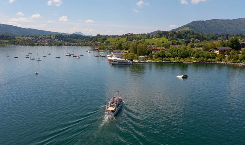 Drone shot, lake promenade with boats at Mondsee, Mondsee, Salzkammergut, Upper Austria, Austria