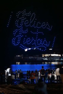 Drone show at night at the Christmas inauguration in San Sebastian, Gipuzkoa. Illuminated city and