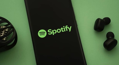 Dhaka, Bangladesh - 18 March 2025: The logo of the spotify is displayed on a smartphone screen