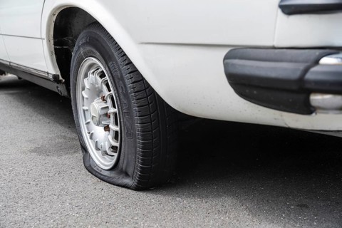 A flat tyre on a car, Wuppertal, Germany