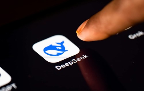 In this photo Illustration a person taps Deepseek App icon on a tablet device on 24 May 2025 in New
