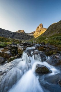 River in Venjesdalen valley, Romsdalshornet mountain, Åndalsnes, Møre og Romsdal, Norway
