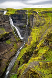 River and waterfalls at a canyon with green moss, Haifoss and Granni waterfall at a canyon, Fossá í