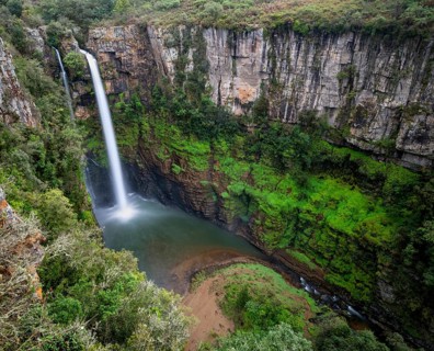 High waterfall in a canyon, Mac-Mac Falls, long exposure, near Graskop, Mpumalanga, South Africa