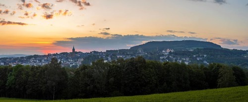 Panorama of the sunrise over Annaberg-Buchholz and Pöhlberg, Erzgebirge, Saxony, Germany