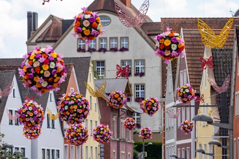 Flower decorations, flower balls over the streets of Ellwangen, Baden-Württemberg, Germany