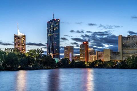 Kaiserwasser, UNO-City and the skyline of Donau City at dusk, Vienna, Austria