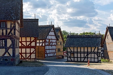 Historic half-timbered farm houses, farmhouses, cobbled street, cobblestones, Hessenpark Open-Air
