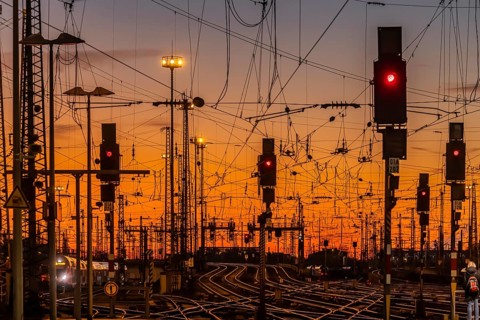 Track apron with trains, rails, points, pylons and signalling systems. Infrastructure at the main