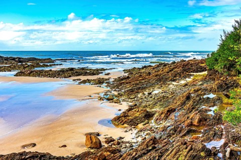 Rocky and deserted beach on the southern coast of Bahia state, Brazil, Serra Grande, Bahia, Brazil