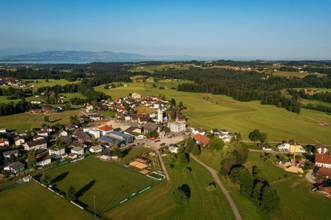 Drone image, view of village with parish church, Hohenweiler, Vorarlberg, Austria
