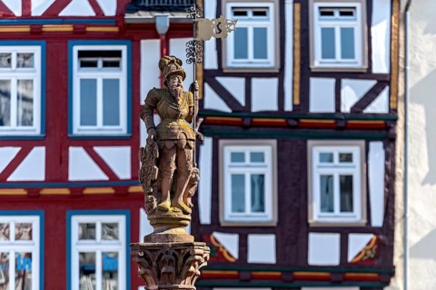 Market fountain man with market flag, knight, sandstone sculpture, fountain figure at the Kump,