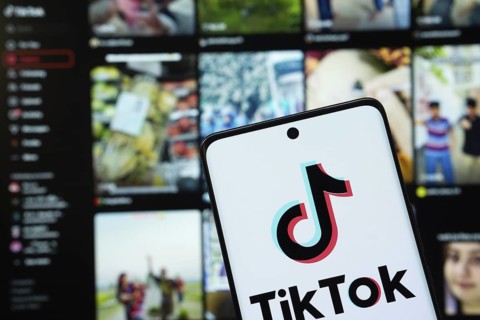Dhaka, Bangladesh - 18 March 2025: The logo of the tiktok is displayed on a smartphone screen, and