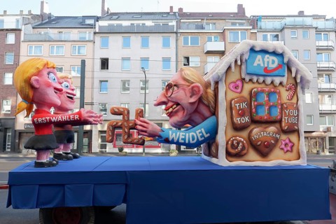 Alice Weidel from the AfD as a Nazi witch, seduces first-time voters with gingerbread in hook