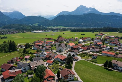 Drone image, view of the village with parish church, Wängle, Rettener Becken, Tyrol, Austria