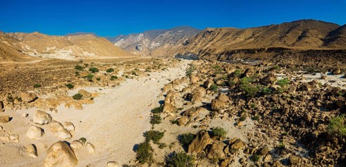 Landscape in Oman, mountains, Wadi Ashawq, road, dry riverbed Salalah, Al Mughsyal / Wadi Ashawq,