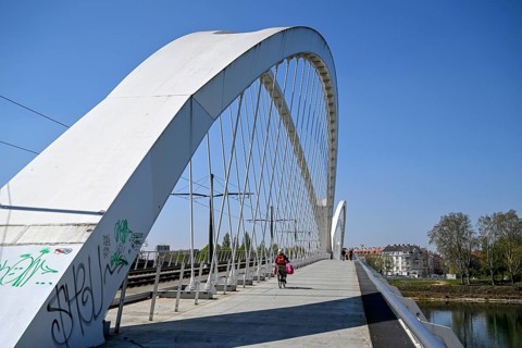 Cyclist on the Beatus-Rhenanus-Bridge, tram bridge over the Rhine, Kehl, Ortenaukreis,