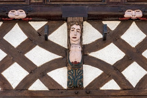 House Schmidt, historical half-timbered house of the baroque period, beams with rough carvings,