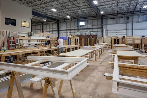 Romulus, Michigan - Workers build apartments in Ginosko Modular 's factory using modular